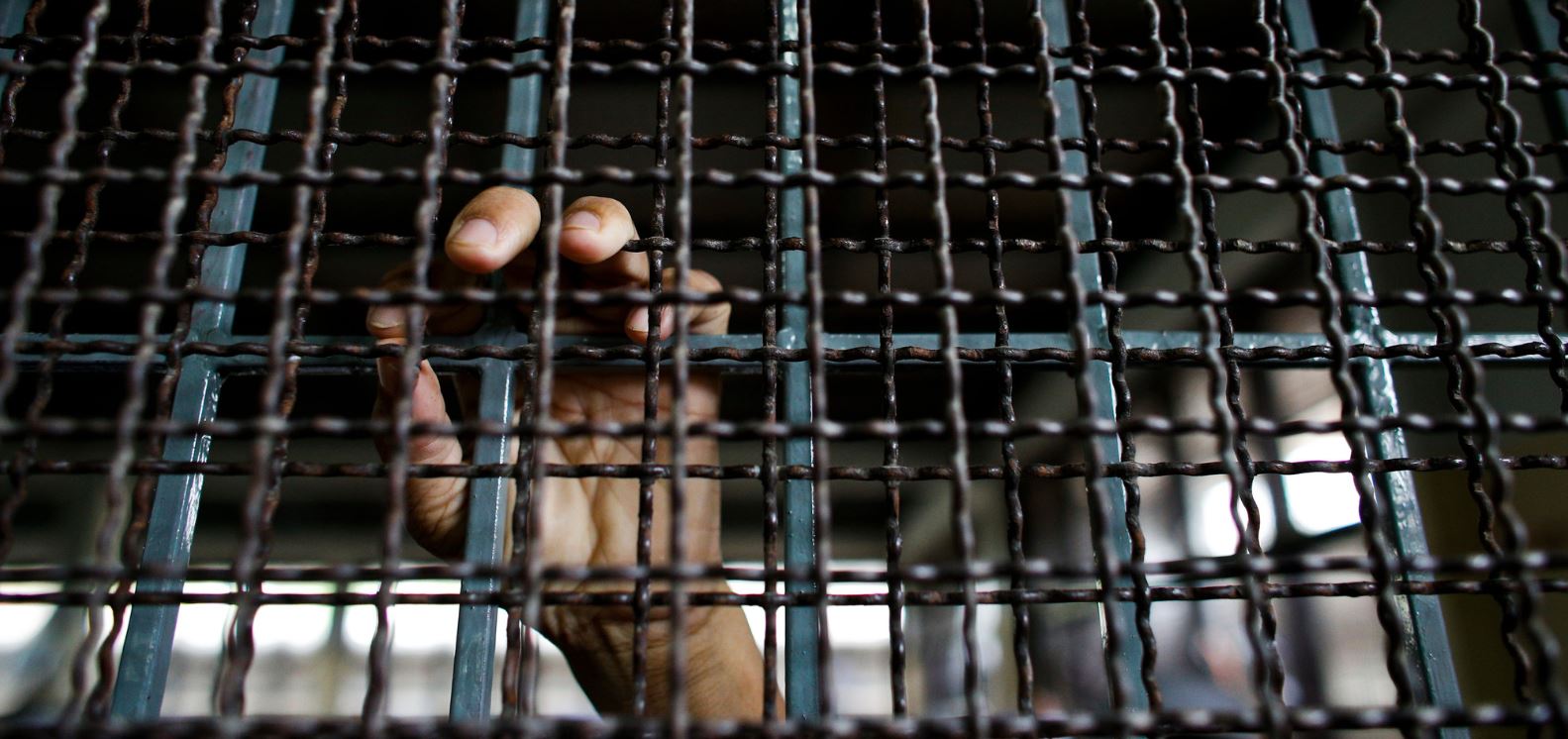 Un demandeur d'asile rohingya dans une cellule du centre de détention pour migrants de la province de Kanchanaburi - Thaïlande 10/07/2013